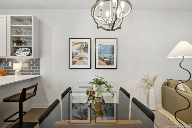 a view of a dining room with furniture