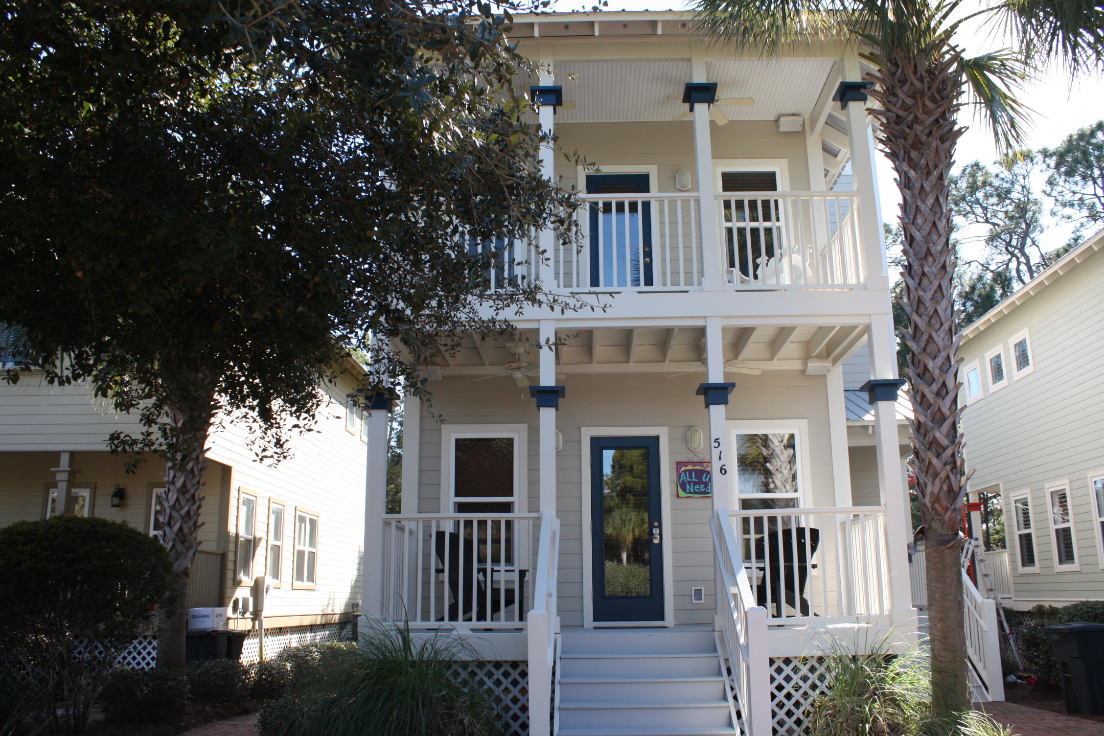 516 Hidden Lake Way Santa Rosa Beach, FL 32459 - Photo 1 of 24 front view of a house with a tree
