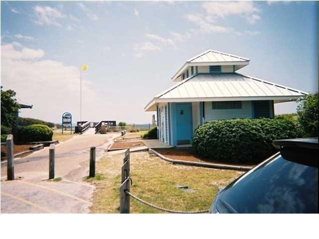 516 Hidden Lake Way Santa Rosa Beach, FL 32459 - Photo 21 of 24 a view of a terrace with chairs