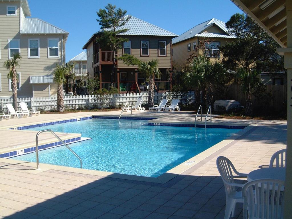 516 Hidden Lake Way Santa Rosa Beach, FL 32459 - Photo 23 of 24 a swimming pool with outdoor seating yard and outdoor seating