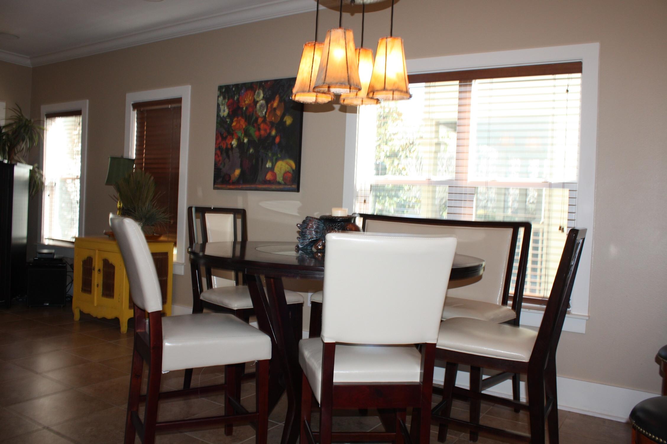 516 Hidden Lake Way Santa Rosa Beach, FL 32459 - Photo 6 of 24 a view of a dining room with furniture and window