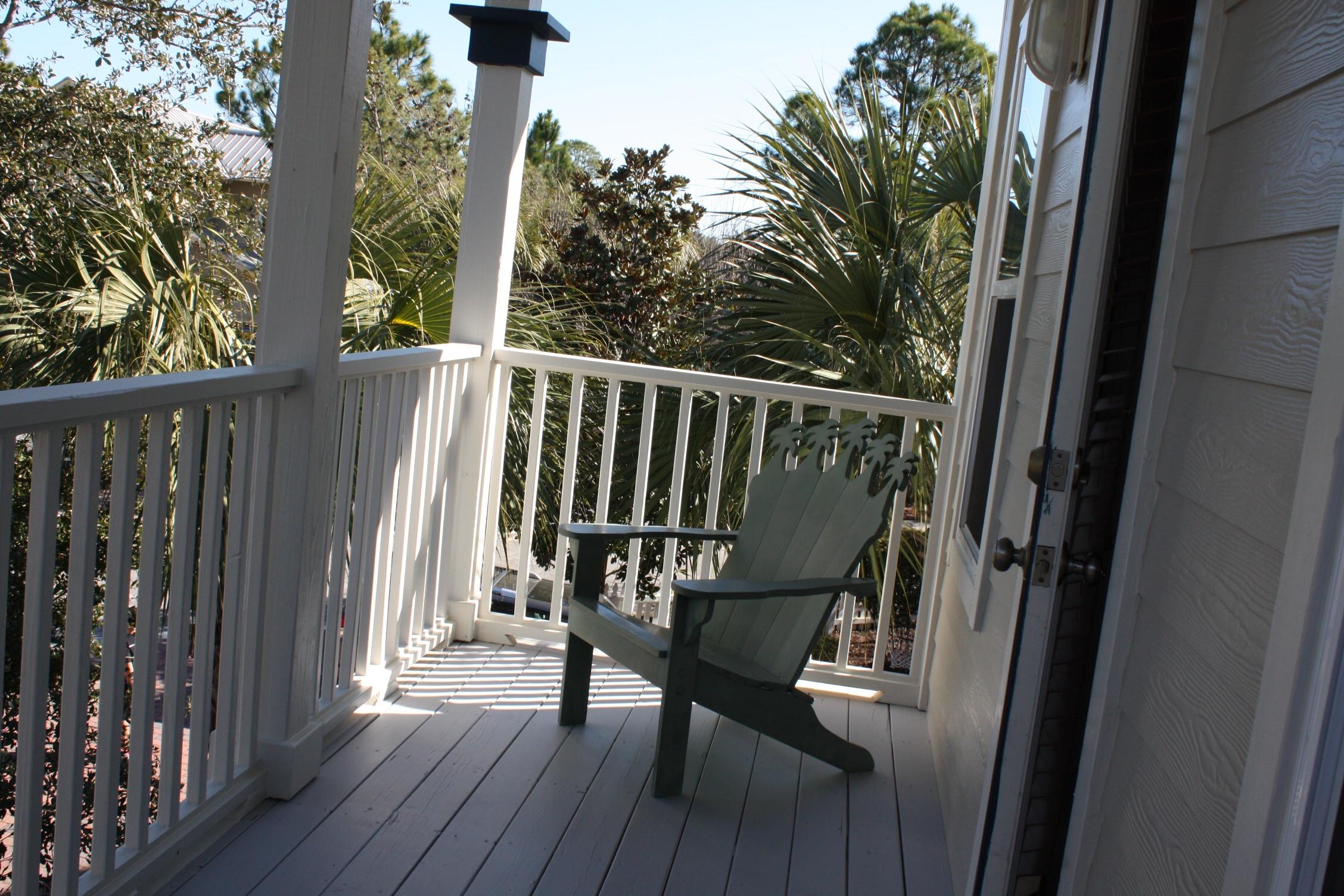516 Hidden Lake Way Santa Rosa Beach, FL 32459 - Photo 9 of 24 a view of balcony with wooden floor and outdoor seating