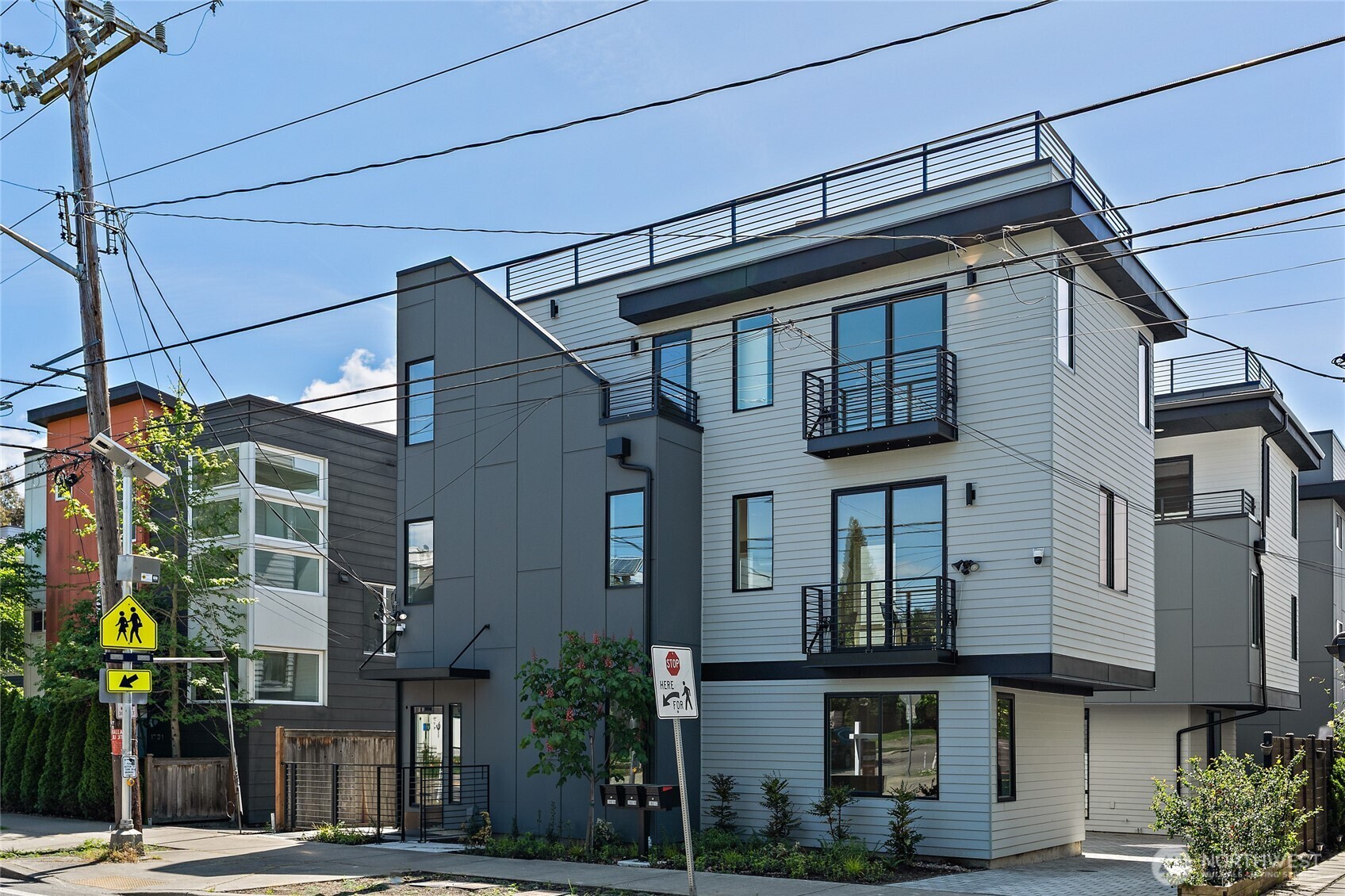 a view of a house with a street