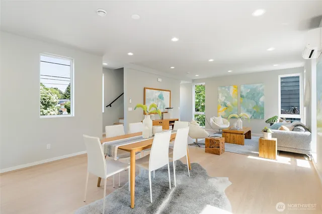 a view of a dining room with furniture window and outside view