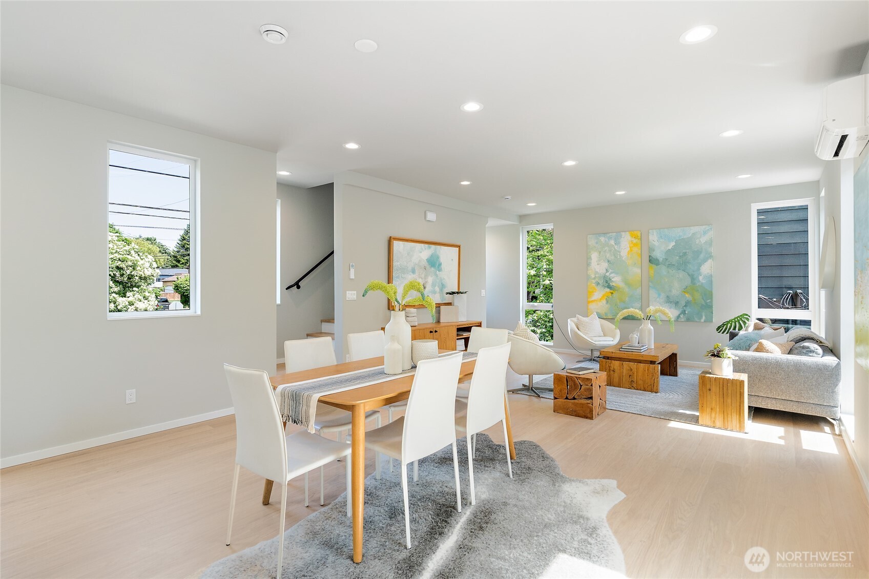 1801 Northwest 65th Street, Unit C Seattle, WA 98117 - Photo 12 of 40 a view of a dining room with furniture window and outside view