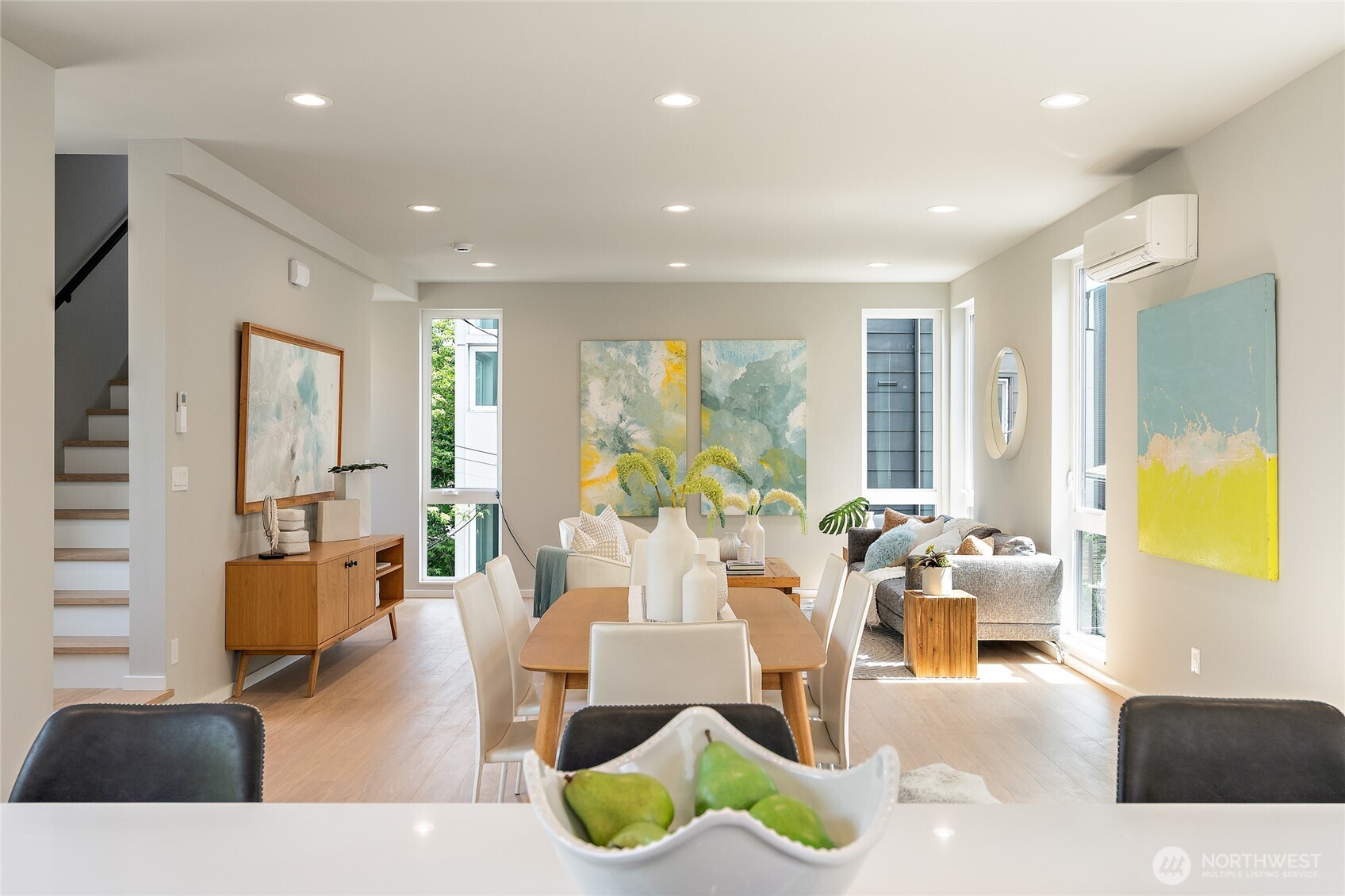 1801 Northwest 65th Street, Unit C Seattle, WA 98117 - Photo 19 of 39 a living room with furniture and a large window