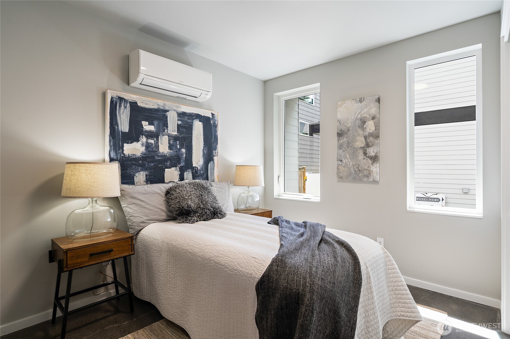 1801 Northwest 65th Street, Unit C Seattle, WA 98117 - Photo 2 of 39 a bedroom with a bed and window