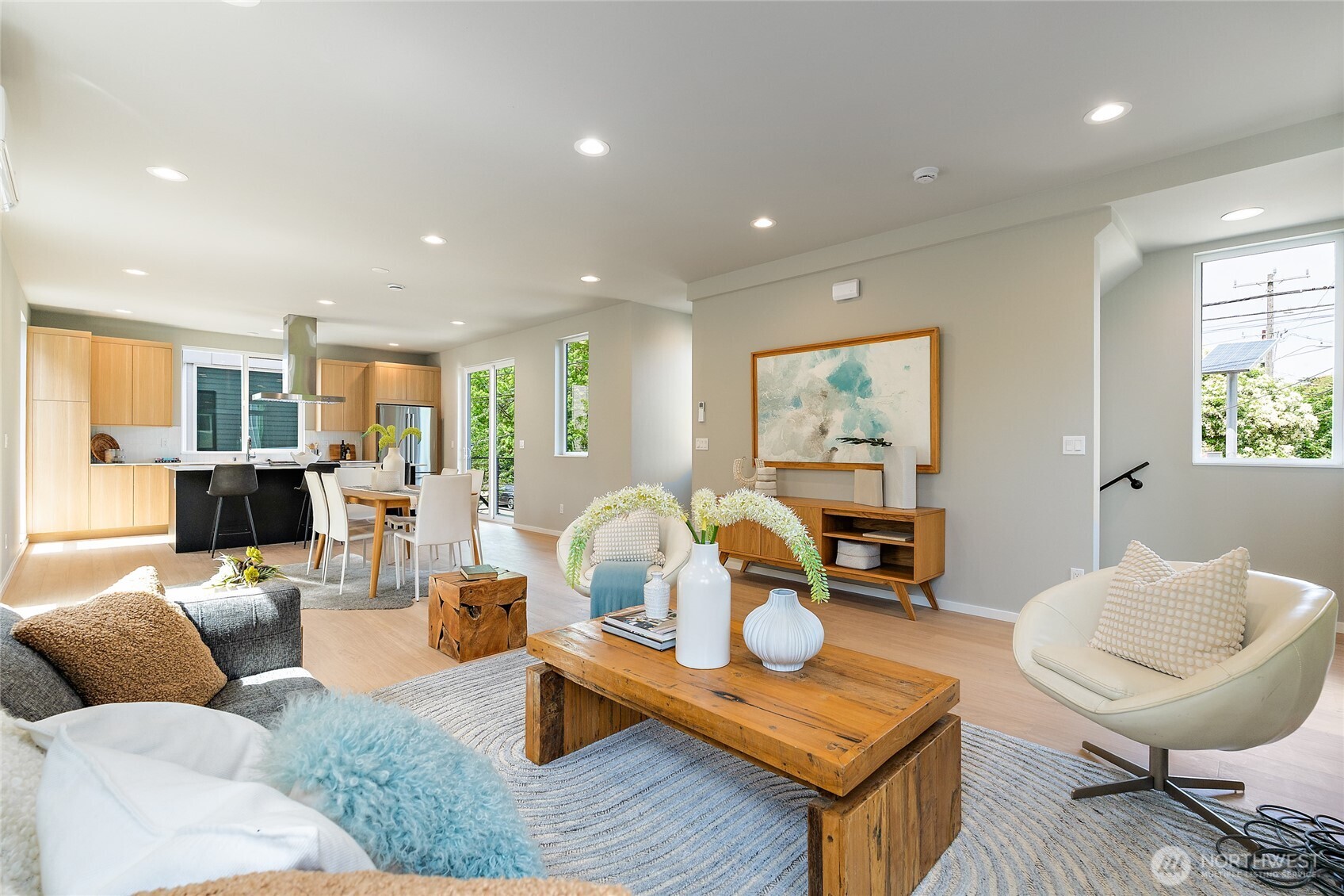 1801 Northwest 65th Street, Unit C Seattle, WA 98117 - Photo 23 of 39 a living room with furniture and kitchen view