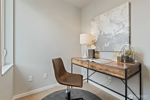 a view of a workspace with furniture