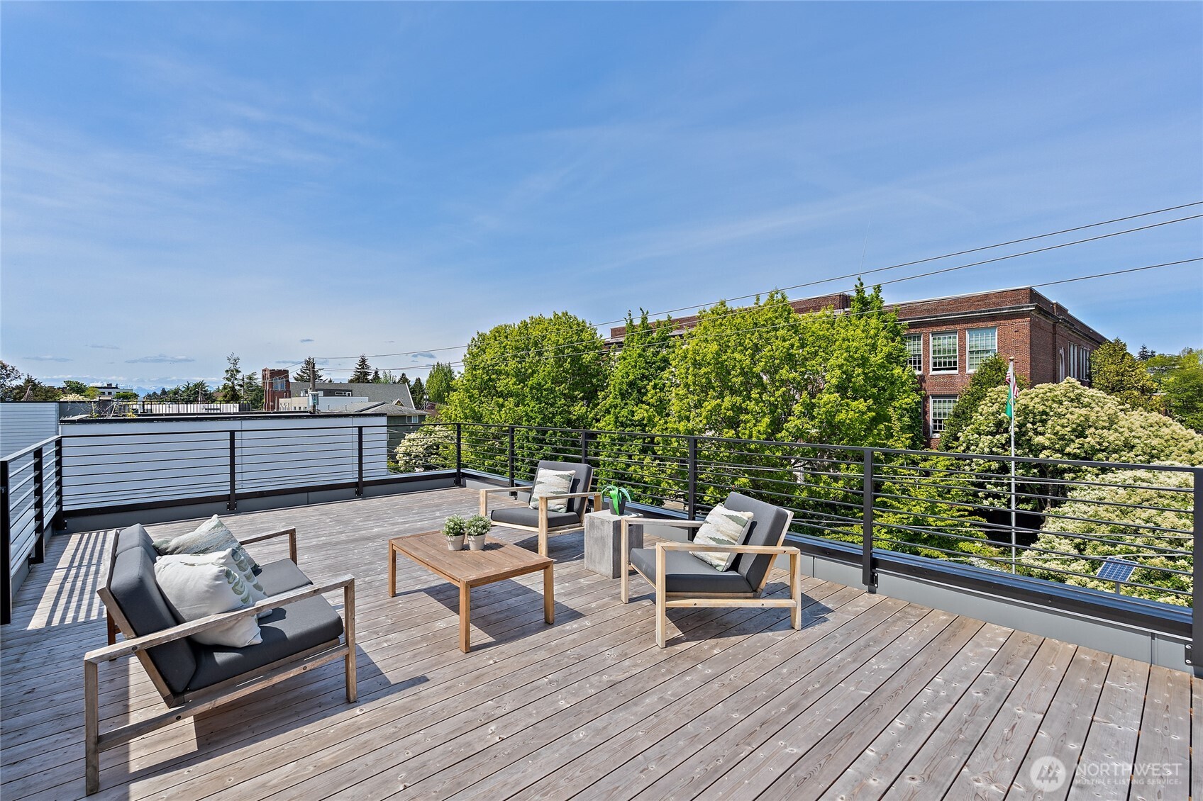 1801 Northwest 65th Street, Unit C Seattle, WA 98117 - Photo 37 of 40 a terrace view with sitting space and garden view