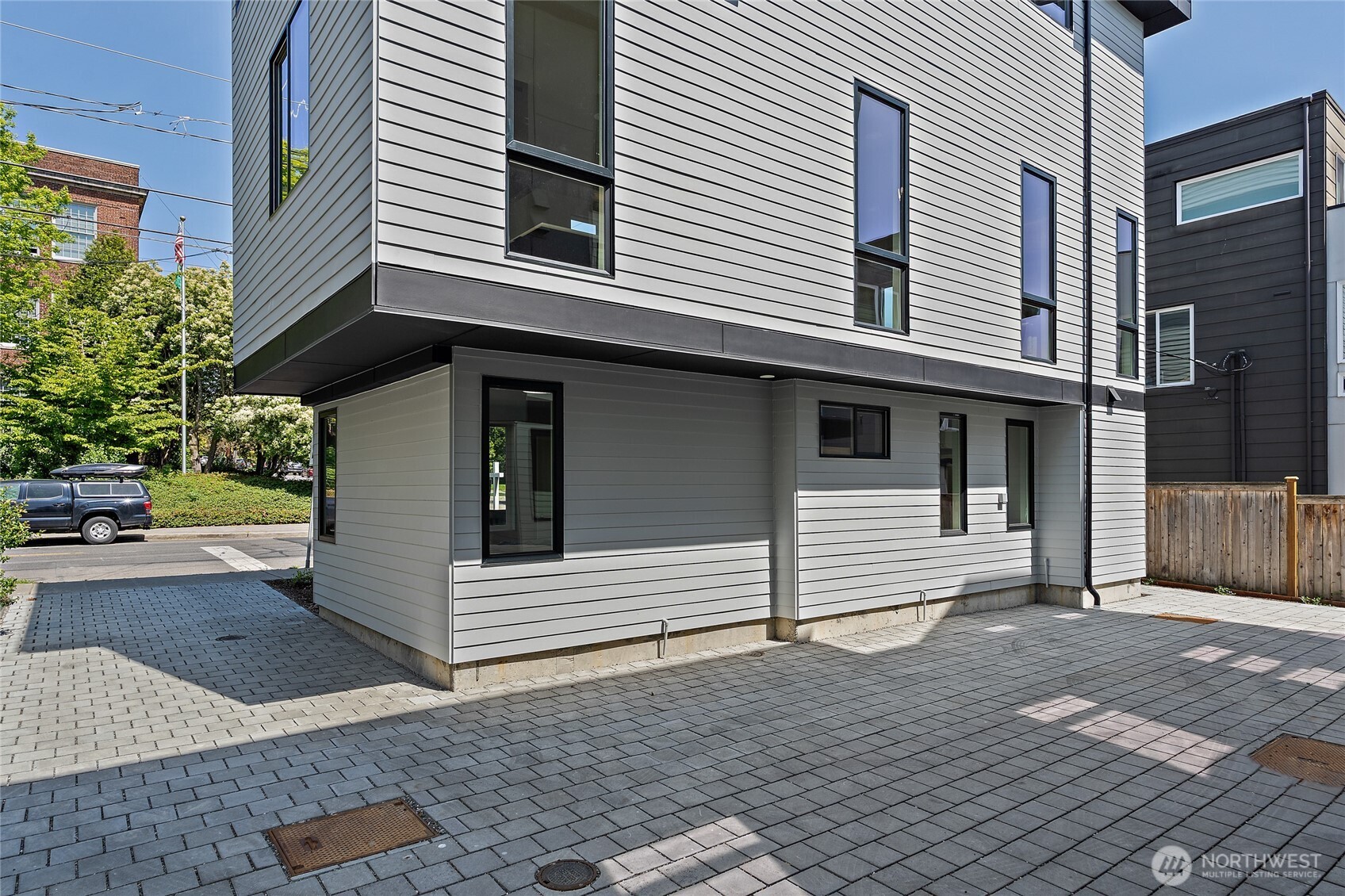 1801 Northwest 65th Street, Unit C Seattle, WA 98117 - Photo 39 of 40 a view of a white house with a large window