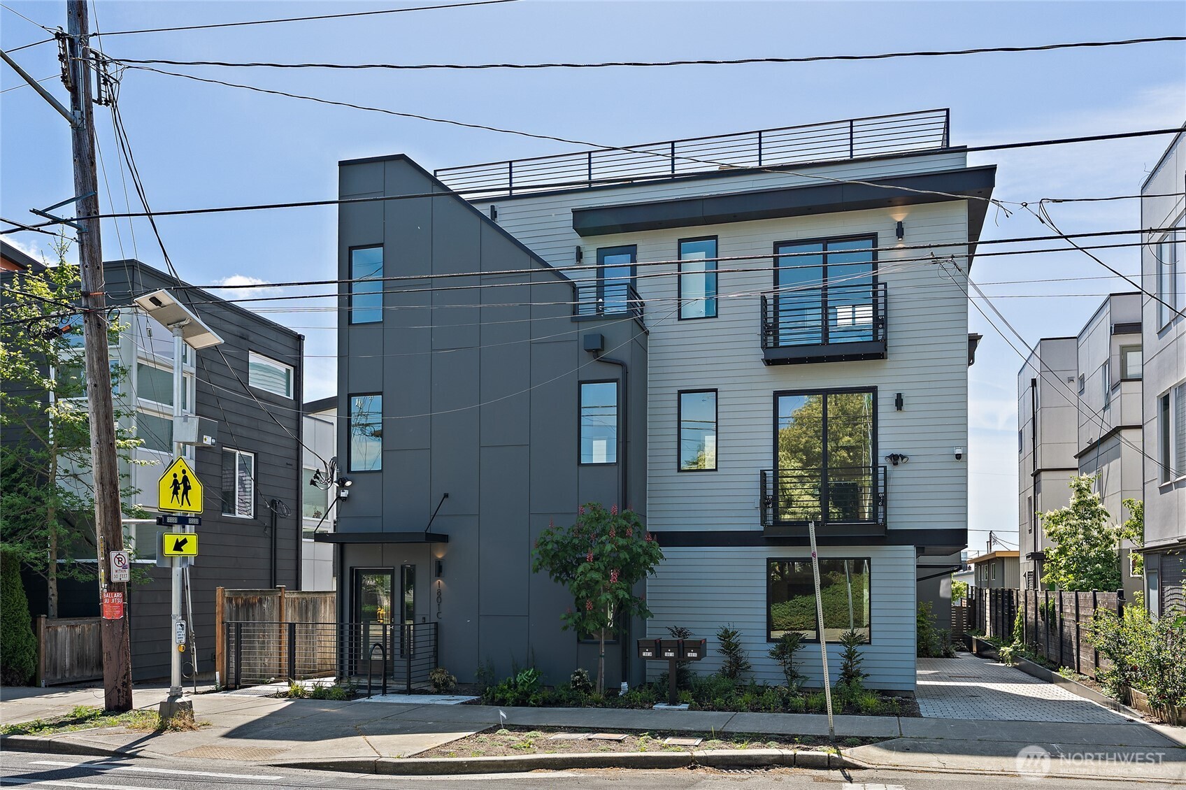 1801 Northwest 65th Street, Unit C Seattle, WA 98117 - Photo 40 of 40 a front view of a building with street
