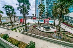 5925 Almeda Road, Unit 10808 Houston, TX 77004 - Photo 9 of 9 a view of swimming pool with a patio and a garden