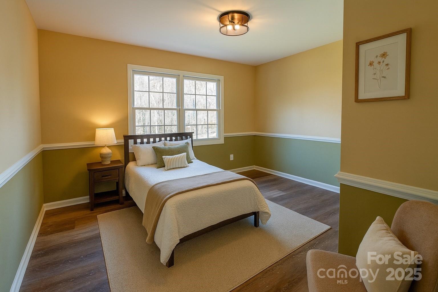 44585 Baldwin Road New London, NC 28127 - Photo 29 of 47 a bedroom with a bed and a window