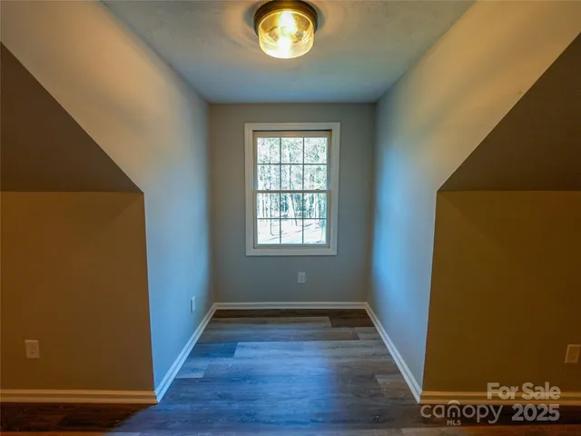 a workspace with furniture and wooden floor