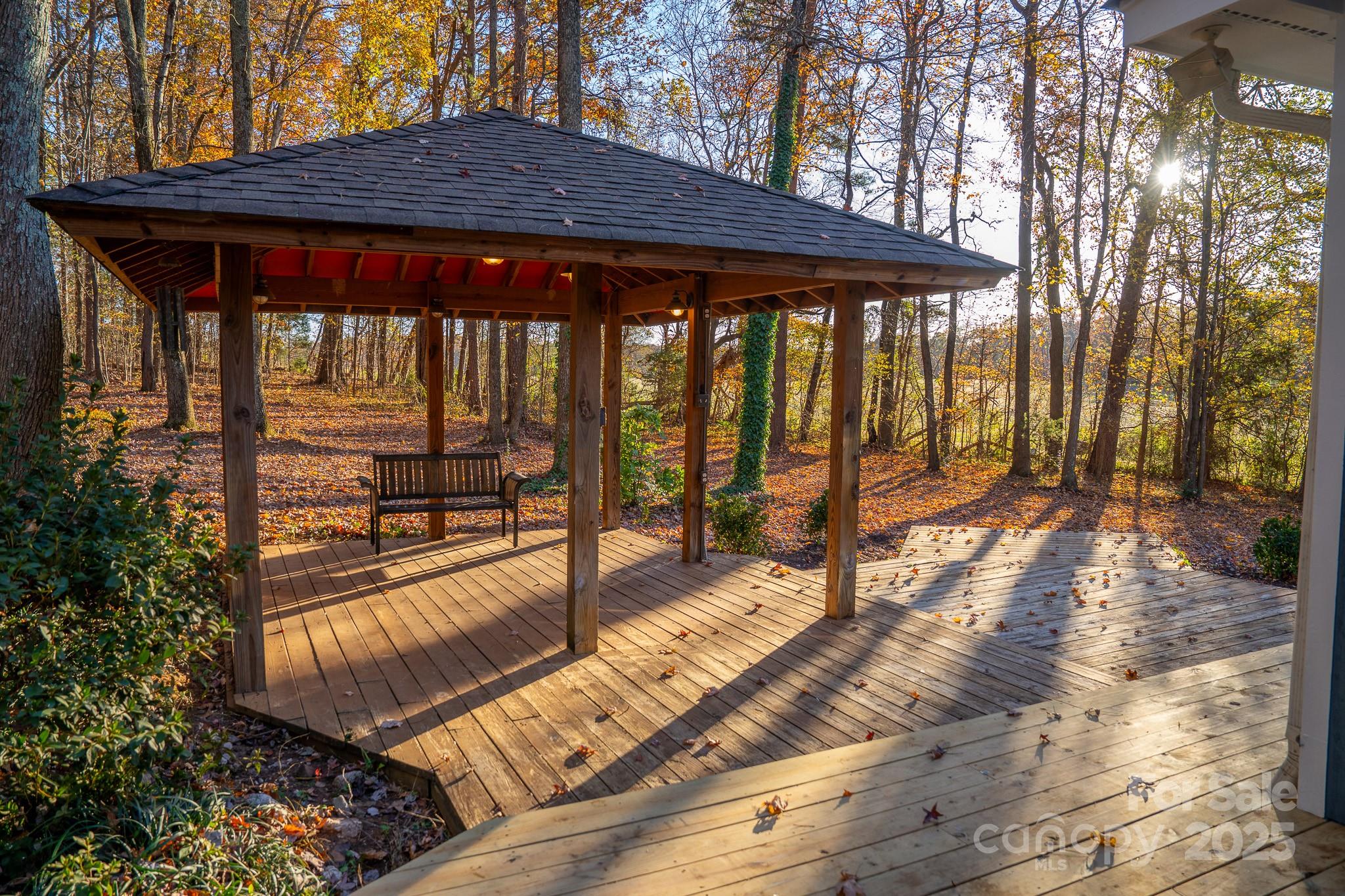 44585 Baldwin Road New London, NC 28127 - Photo 40 of 47 a view of a backyard with a large tree