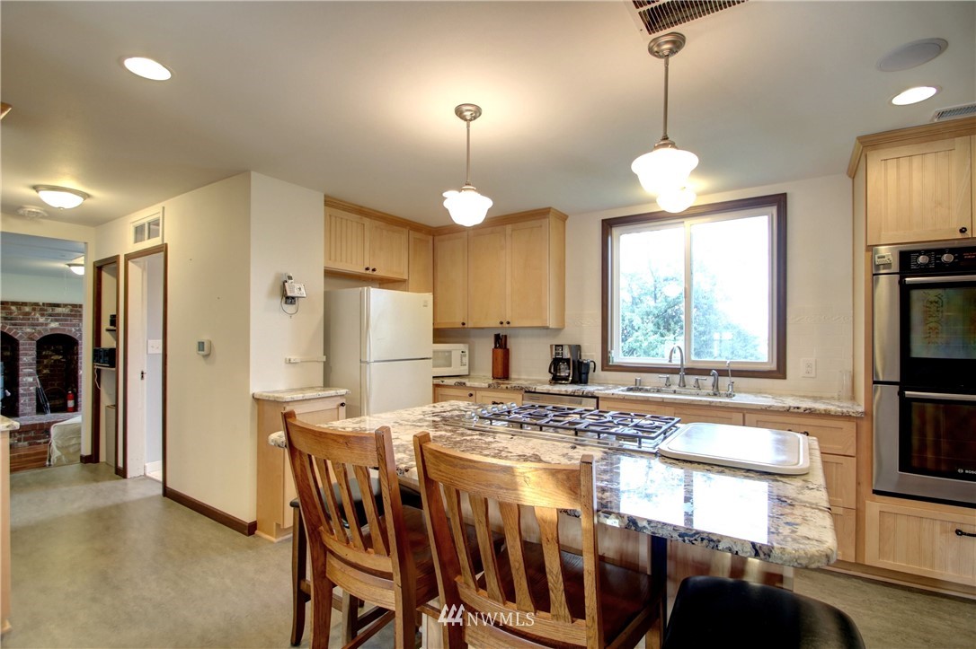 17820 Kamb Road Mount Vernon, WA 98273 - Photo 14 of 39 a view of a dining room with furniture window and outside view