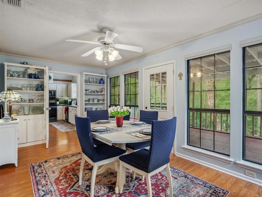 299 Lamplight Path Holly Lake Ranch, TX 75765 - Photo 17 of 40 a view of a dining room with furniture