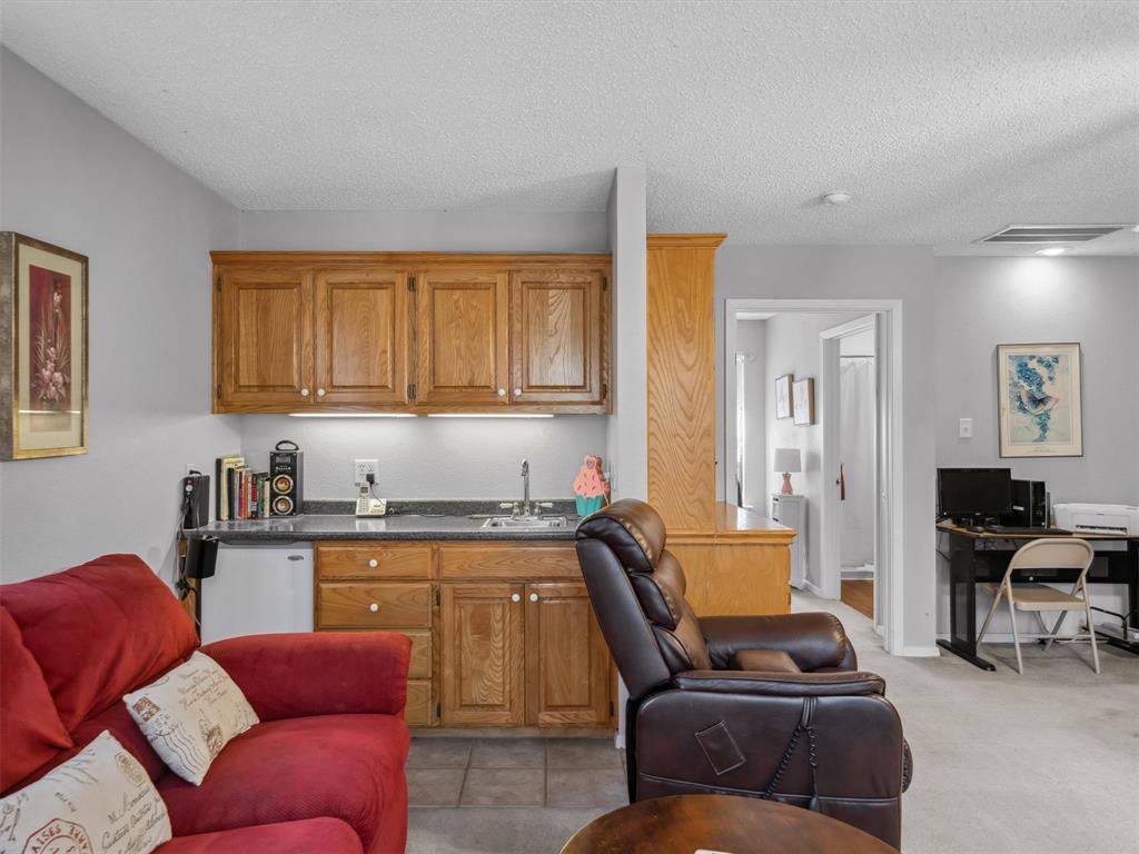 299 Lamplight Path Holly Lake Ranch, TX 75765 - Photo 26 of 40 a living room with furniture and a lamp