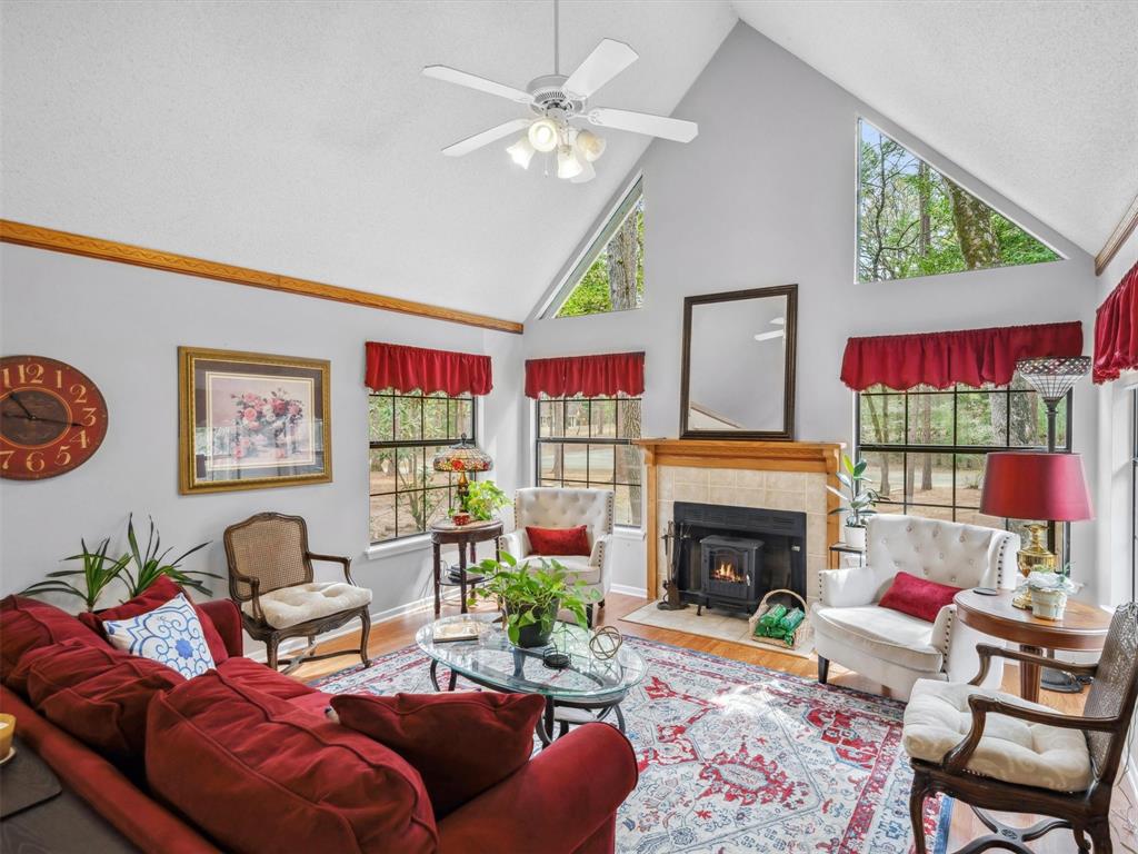 299 Lamplight Path Holly Lake Ranch, TX 75765 - Photo 9 of 40 a living room with furniture fireplace and rug