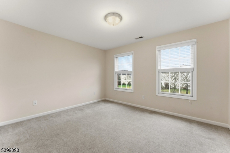 26 Rouser Way Hillsborough, NJ 08844 - Photo 34 of 50 an empty room with windows