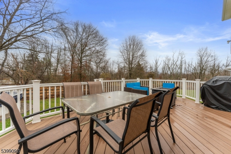 26 Rouser Way Hillsborough, NJ 08844 - Photo 40 of 50 a view of a chairs and table on the deck