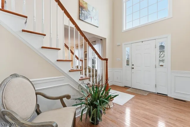 a view of entryway with wooden floor and a potted plant