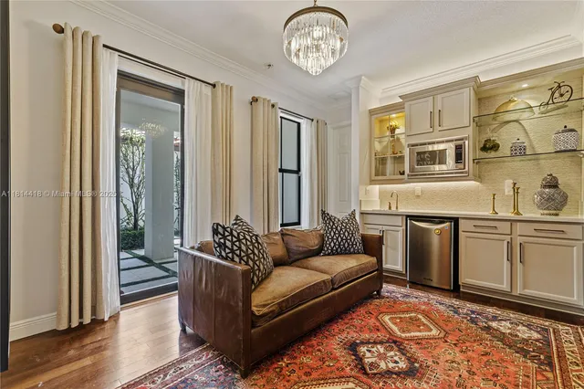 a bathroom with a granite countertop toilet sink and mirror