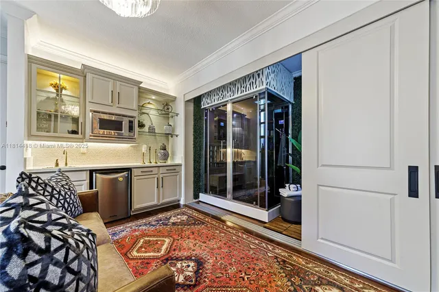 a living room with furniture and a rug