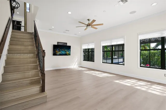 a kitchen with a sink and a mirror