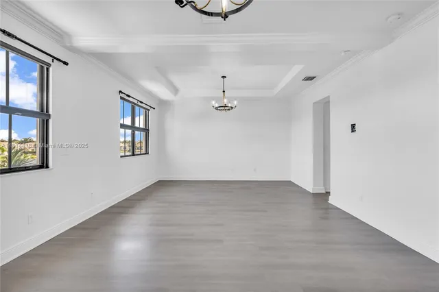 wooden floor and window in a room