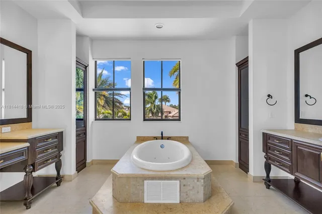 a view of a yard and swimming pool