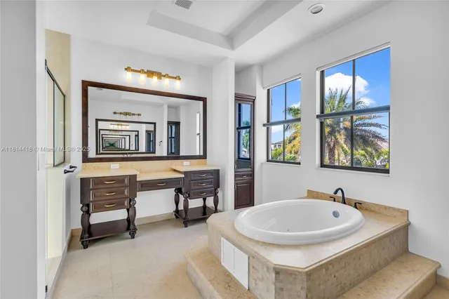 a view of a backyard with palm tree