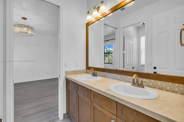 a view of a swimming pool with outdoor seating