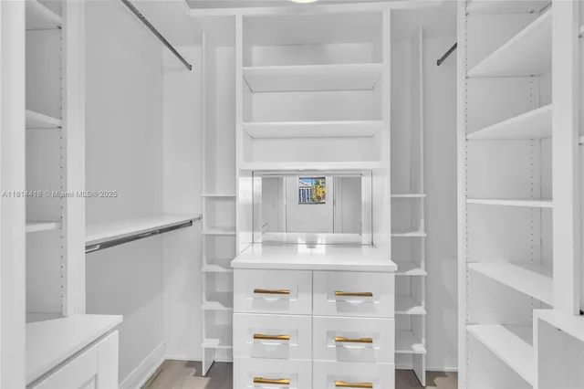 a view of a swimming pool with a yard