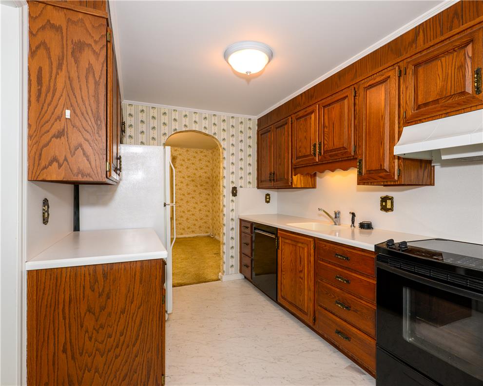 2270 Rodgers Street Bethlehem, PA 18017 - Photo 6 of 24 This kitchen offers functional cabinetry and appliances, ready for culinary endeavors.