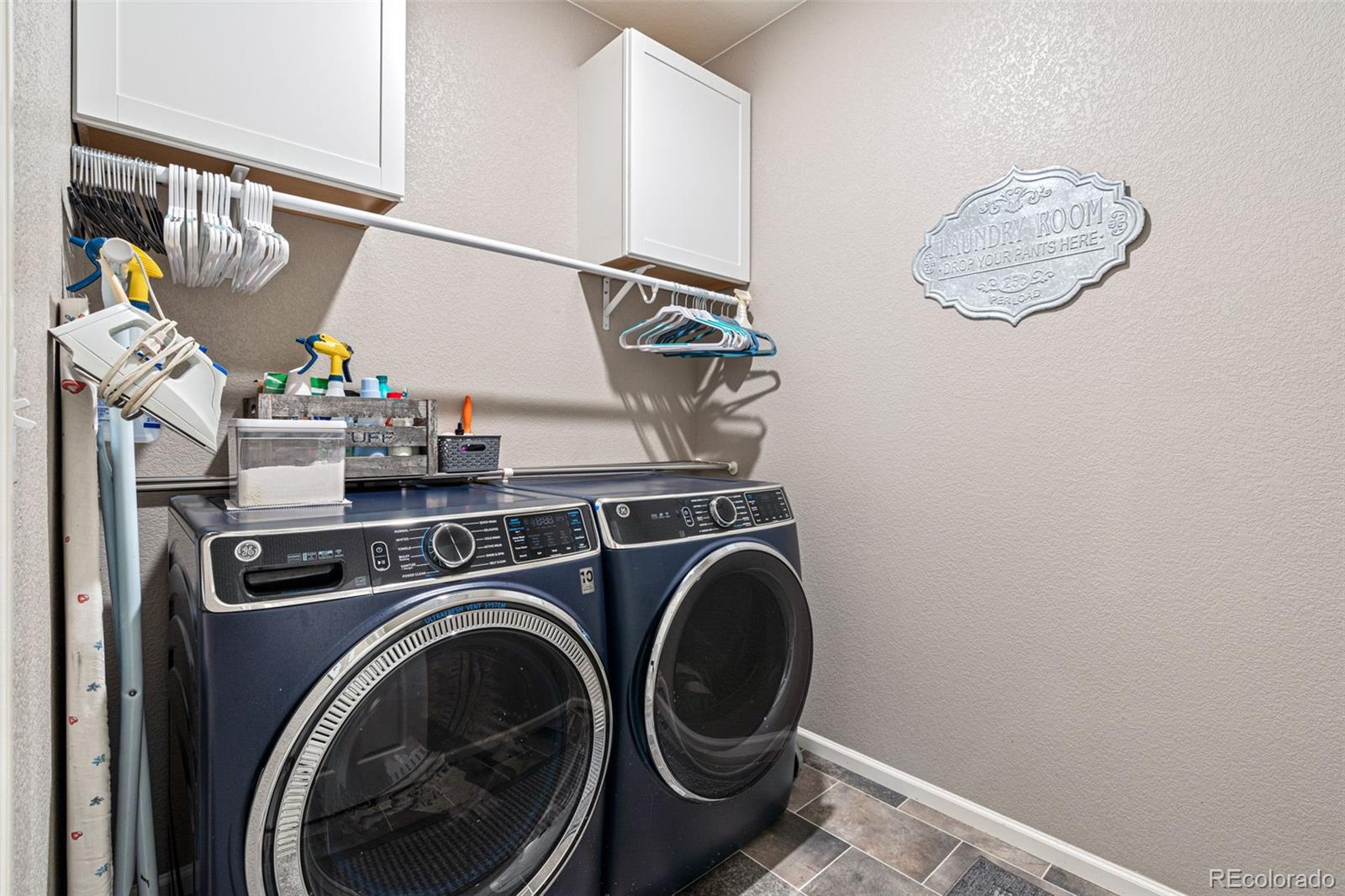 10054 Carefree Street Firestone, CO 80504 - Photo 37 of 50 a utility room with dryer and washer