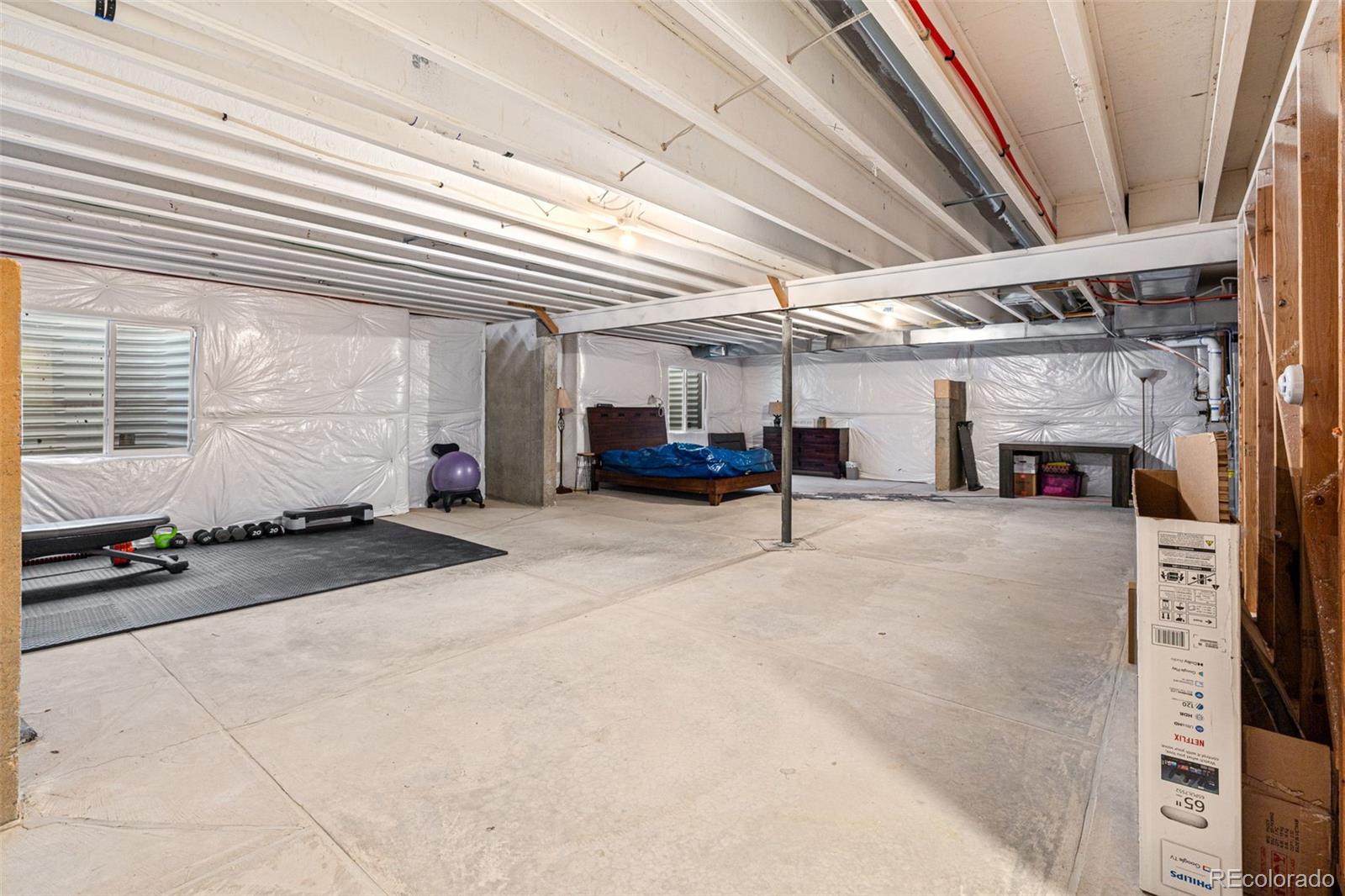 10054 Carefree Street Firestone, CO 80504 - Photo 38 of 50 a view of parking area and car parked