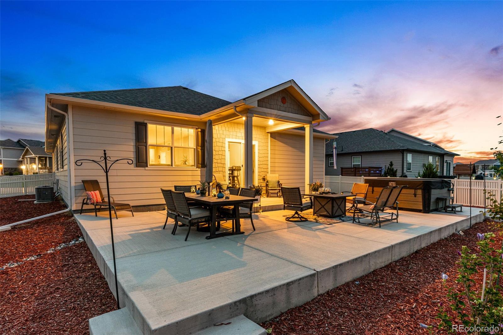 10054 Carefree Street Firestone, CO 80504 - Photo 41 of 50 a outdoor space with chairs and couch
