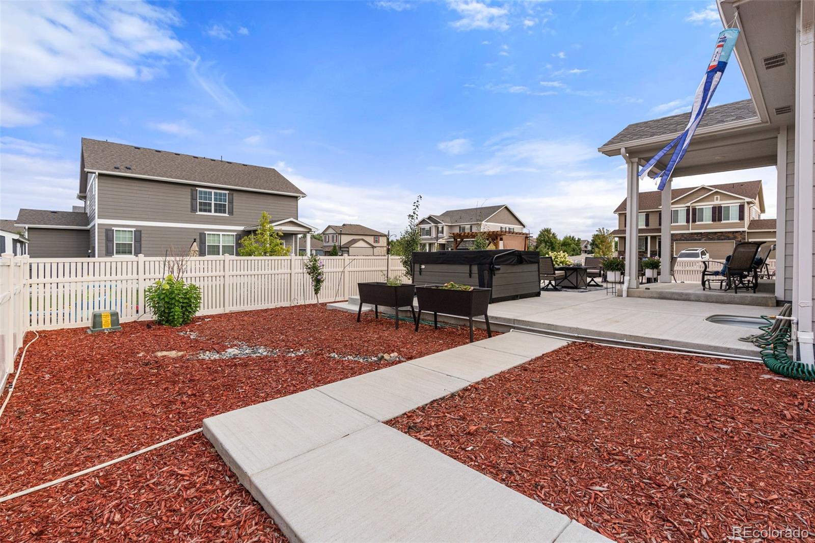 10054 Carefree Street Firestone, CO 80504 - Photo 48 of 50 a view of a house with entertaining space