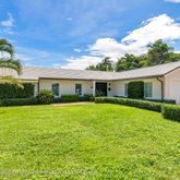 a house view with a garden space
