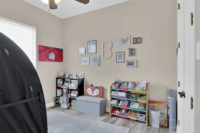 a room with furniture and a book shelf