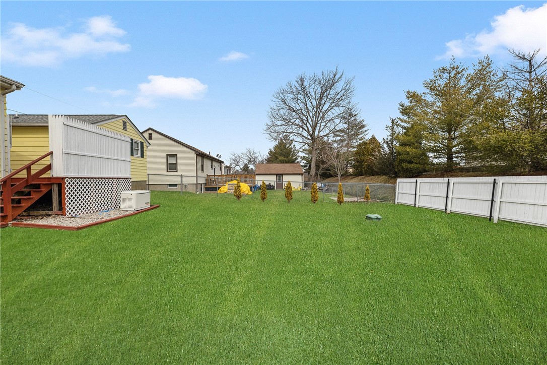 7 Casey Drive Middletown, RI 02842 - Photo 44 of 47 Fenced in yard. Grass has been virtually enhanced.