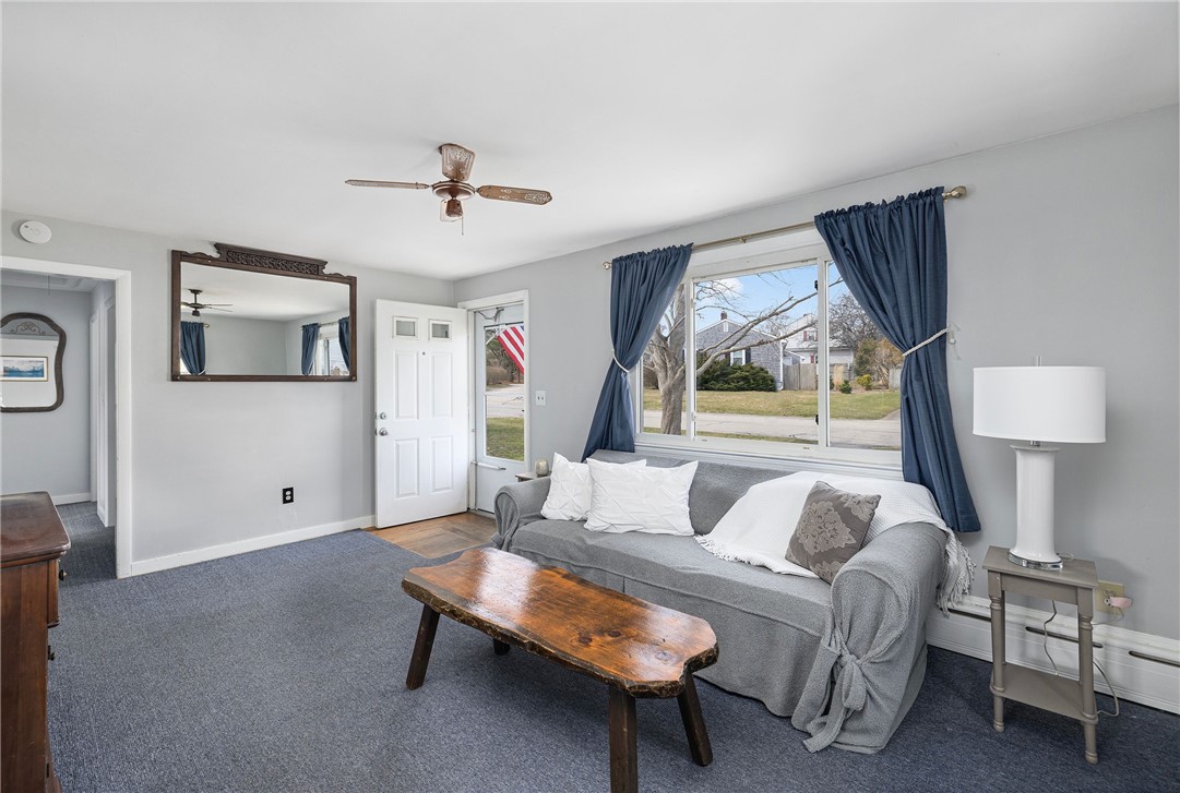 7 Casey Drive Middletown, RI 02842 - Photo 5 of 47 With coat closet behind front door.
