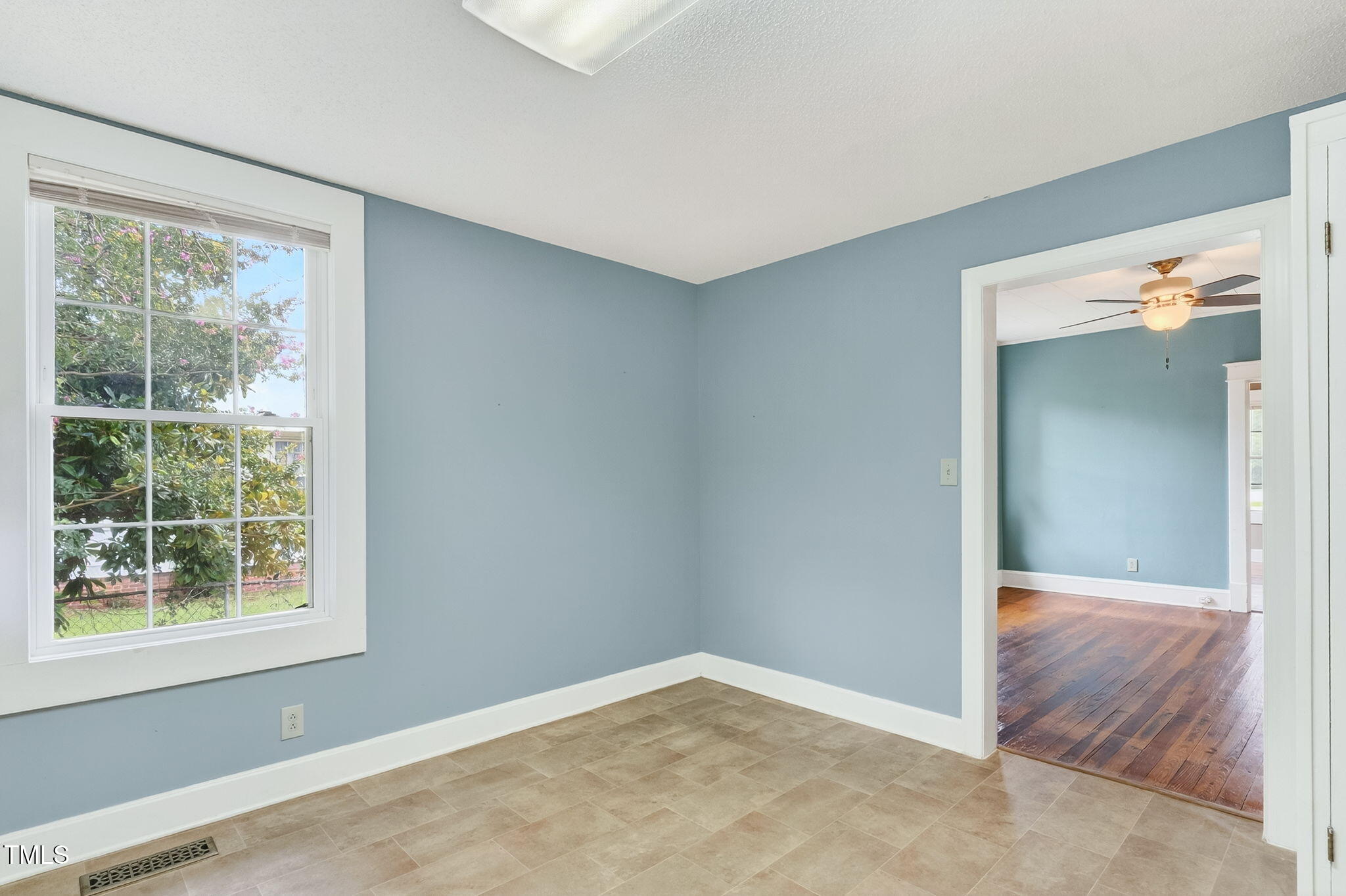 108 West C Street Erwin, NC 28339 - Photo 18 of 37 an empty room with windows and closet