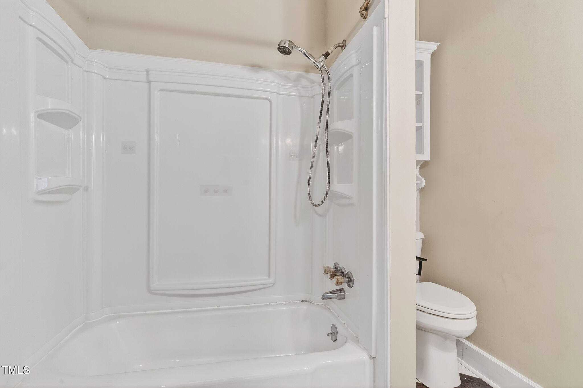 108 West C Street Erwin, NC 28339 - Photo 20 of 37 a bathroom with a shower a toilet and a shower