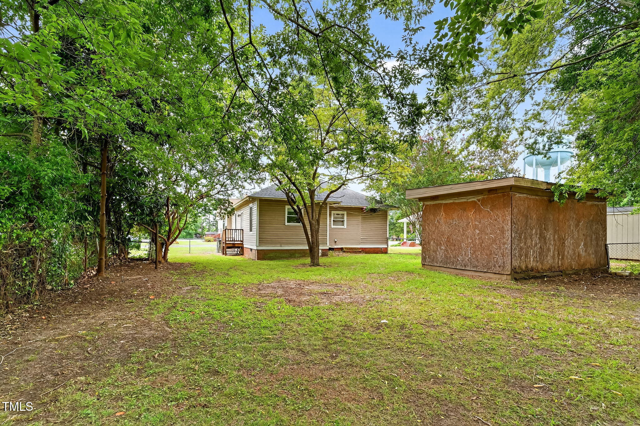 108 West C Street Erwin, NC 28339 - Photo 24 of 37 a view of a house with a yard