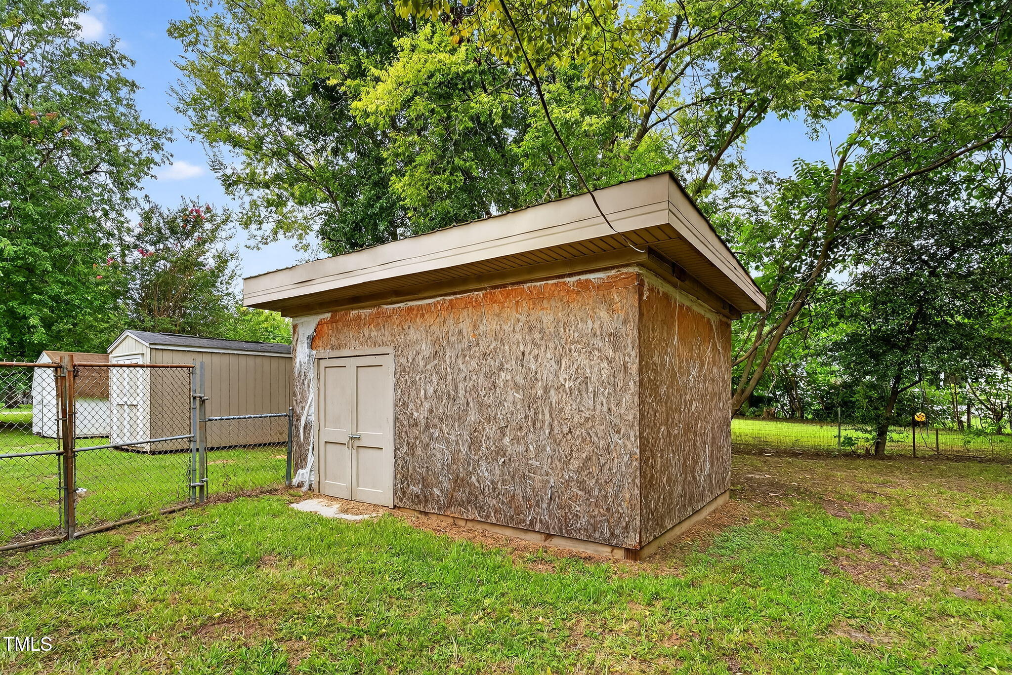 108 West C Street Erwin, NC 28339 - Photo 25 of 37 a backyard of a house with lots of green space