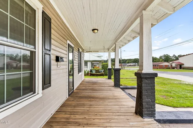 a front view of a house with a ocean view