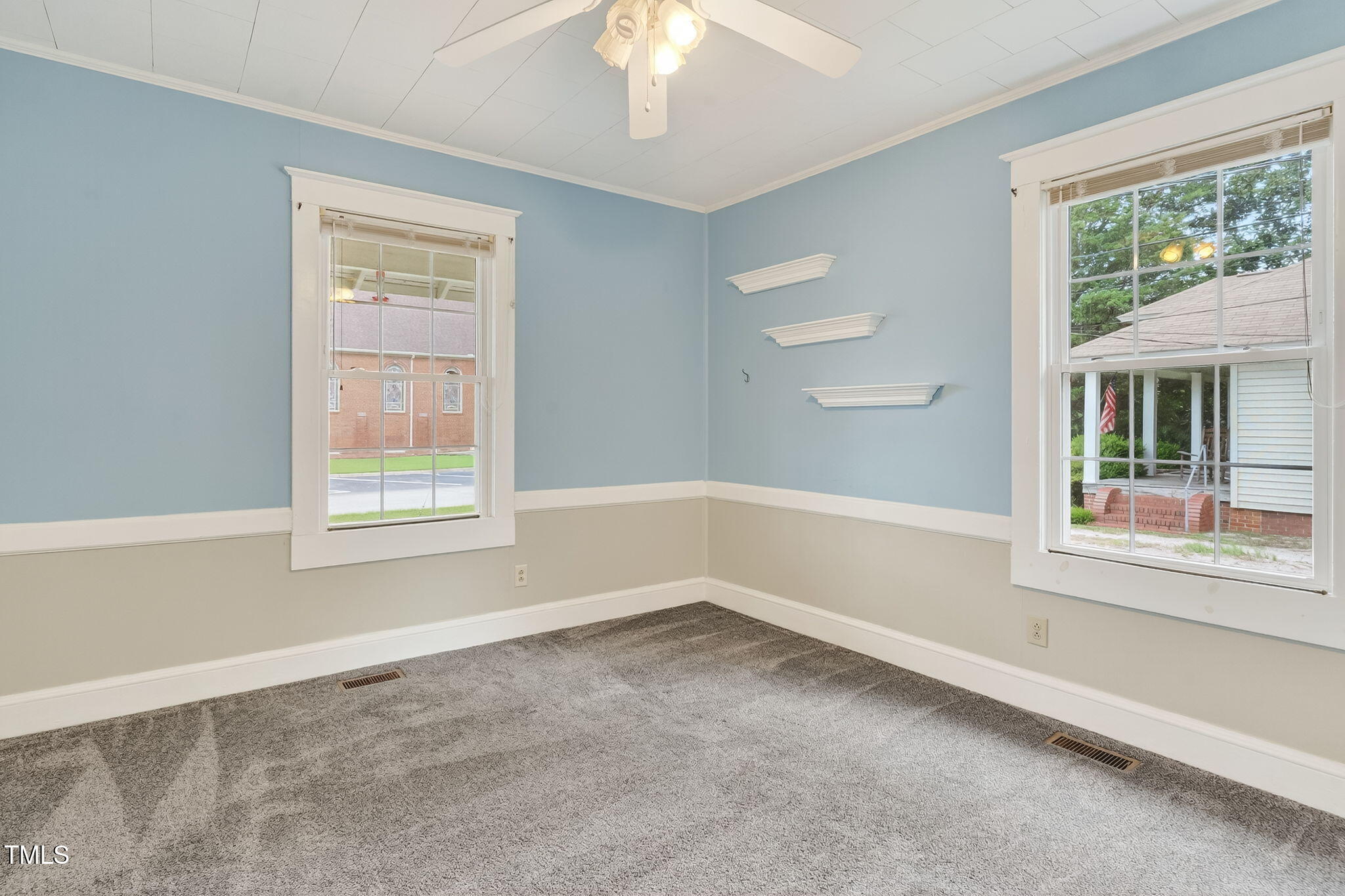108 West C Street Erwin, NC 28339 - Photo 10 of 37 an empty room with a window